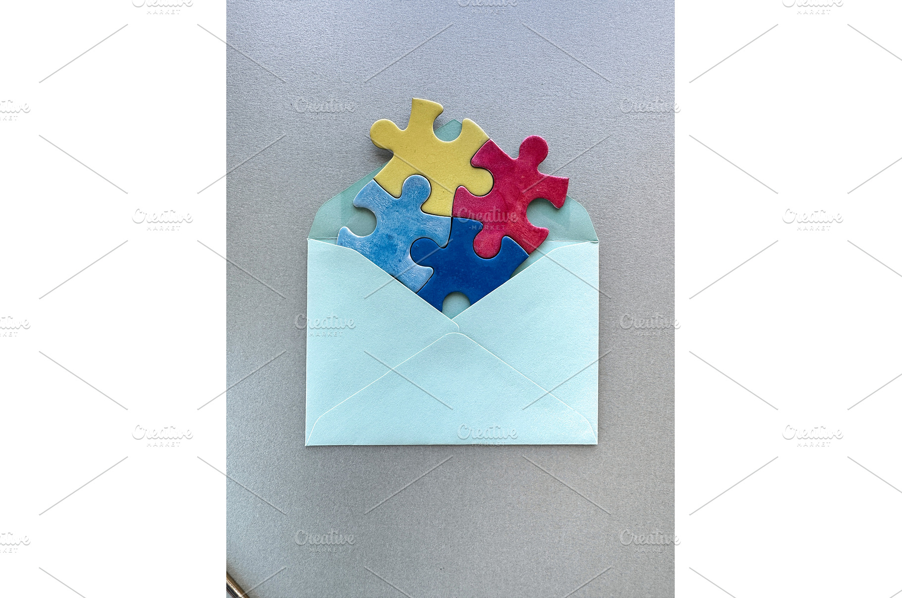 Colorful puzzle pieces emerging from, a Photo by tilialucida