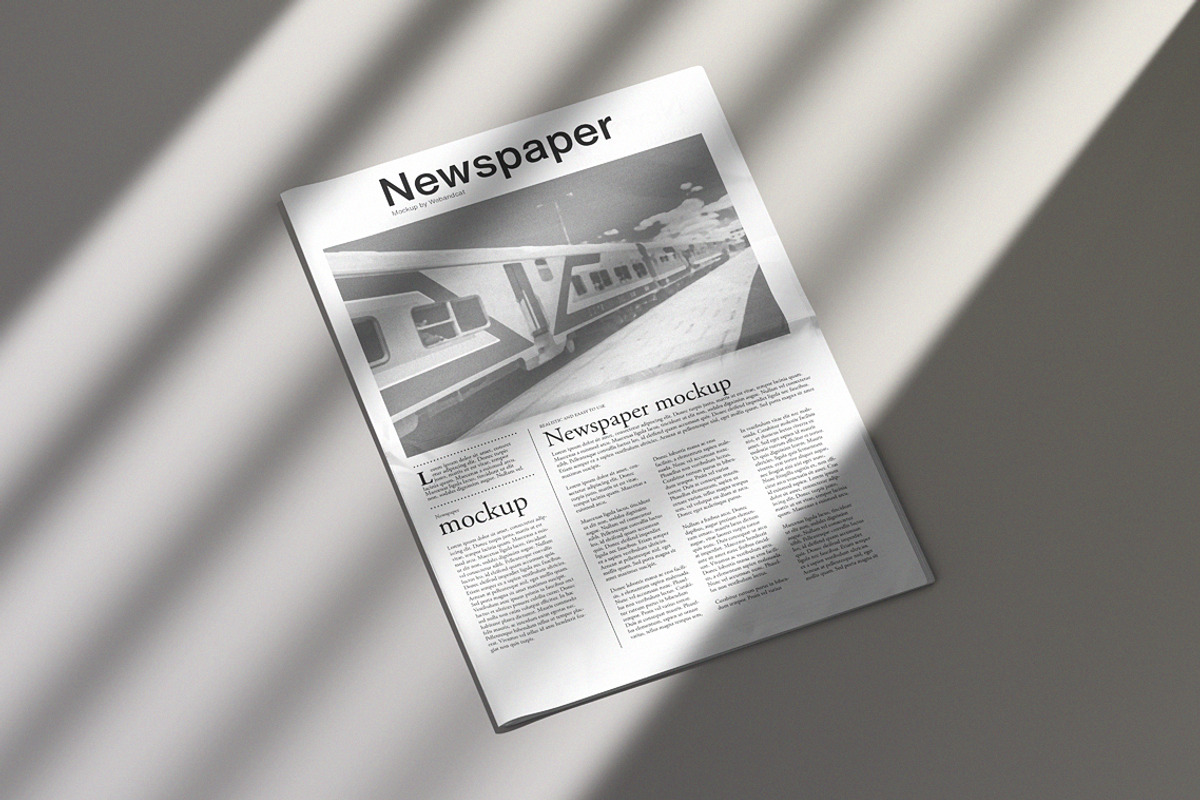 Newspaper Mockup, a Books & Magazine Mockup by WebAndCat (Photo 6 of 13)
