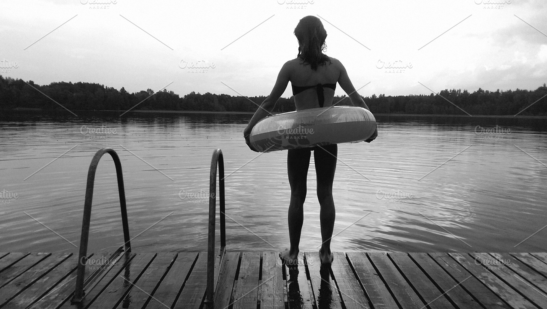Girl with water wheel by the lake, a Person Photo by BOOCYS