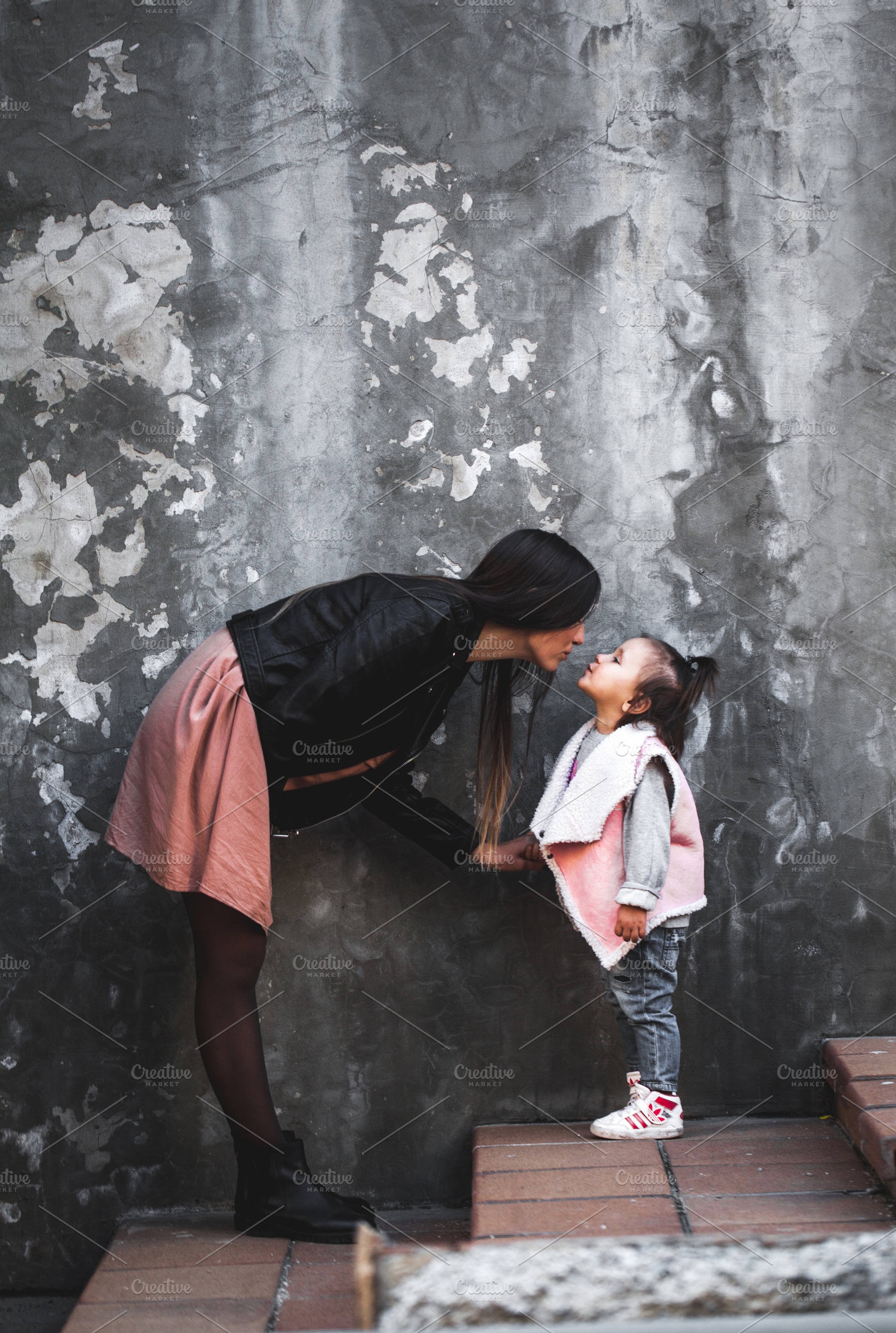 Mom and daughter are kissing, a Person Photo by OS