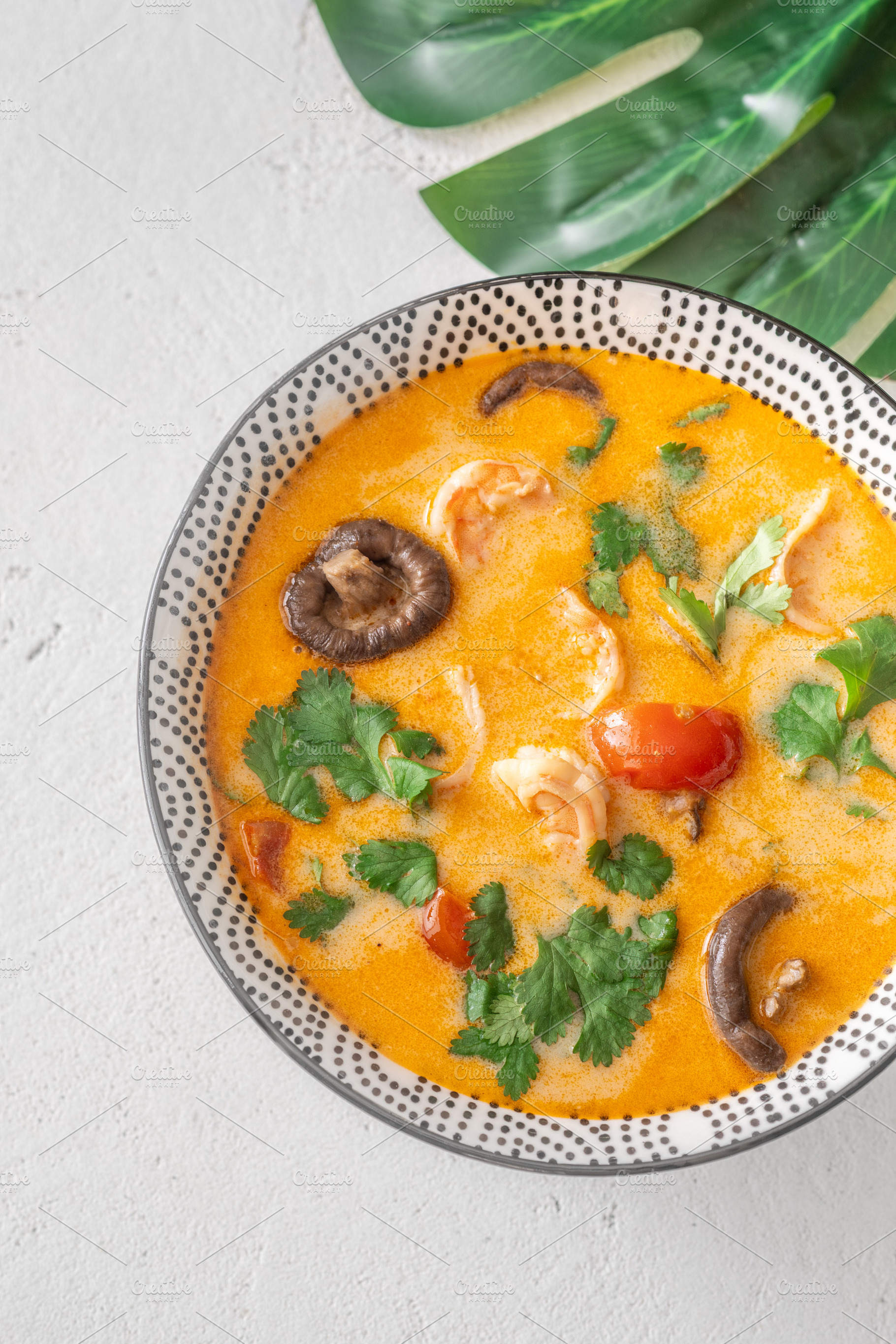 Creamy tom yum soup with shrimp, a Food & Drink Photo by Alexander Prokopenko