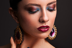 portrait of a girl in makeup body art body painting with jewelry, a Person Photo by Weddings, People, Travel