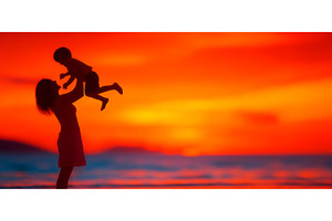 A joyful family enjoys themselves on, a Person Photo by ZinetroN
