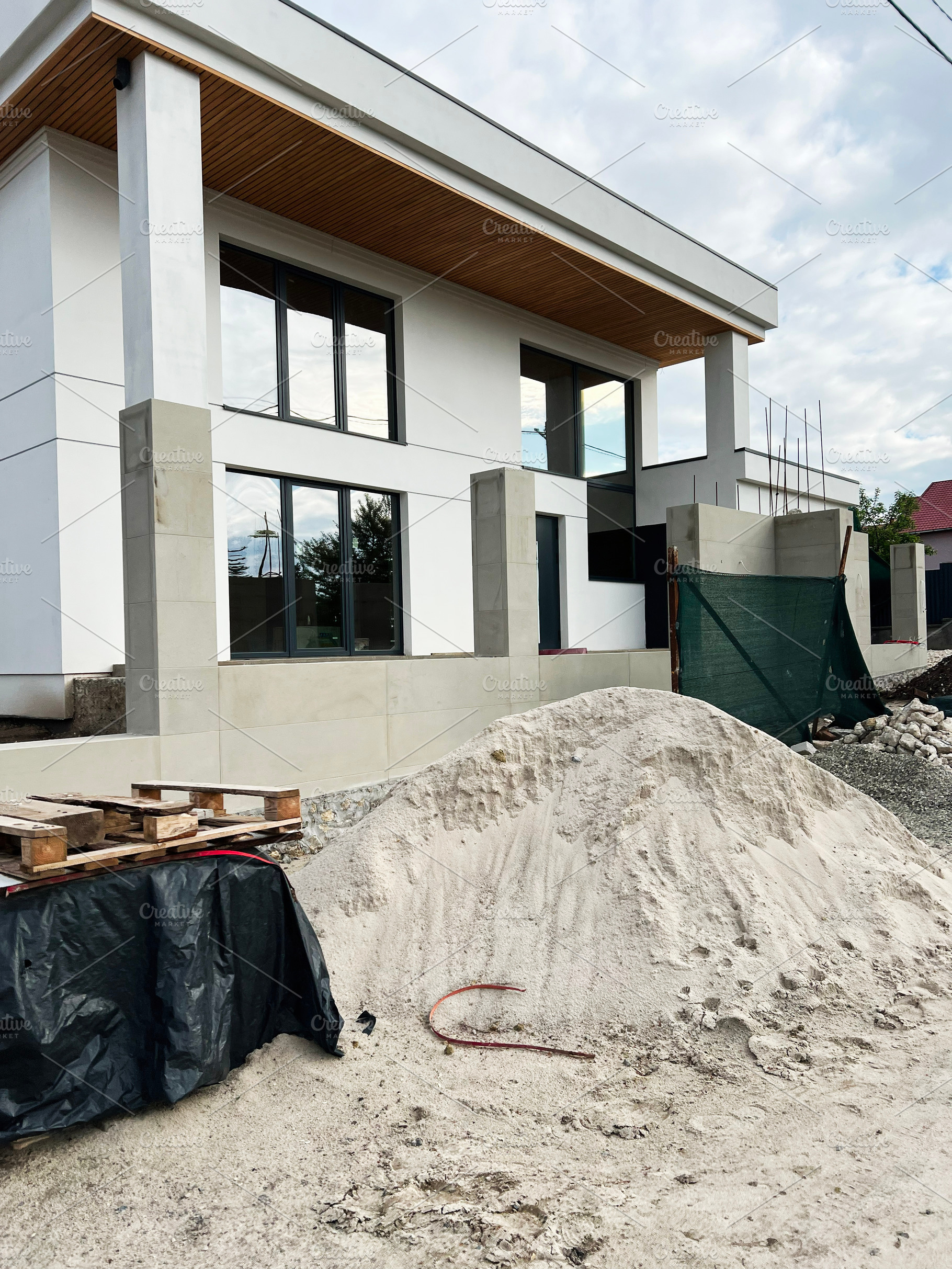 Modern house under construction with a focus on architectural and design detail, a Photo by AS photostudio