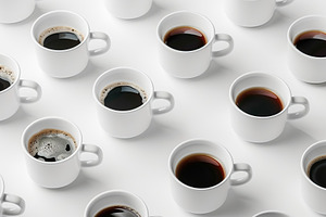 Different cups of coffee on white background, a Food & Drink Photo by AlyaAnd