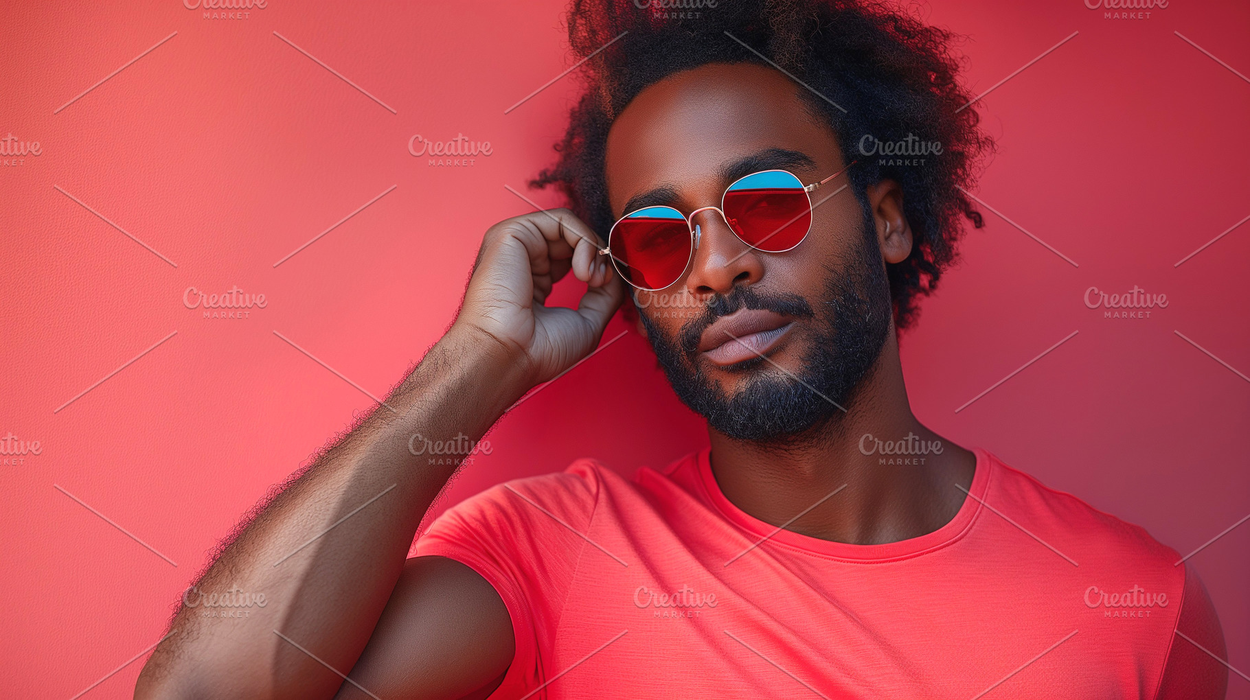 Stylish Black man with curly hair poses confidently against a vibrant coral bac, a Person Photo by ImageMir