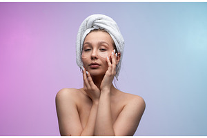 Young woman with a towel wrapped, a Person Photo by volodymyrshtun13795