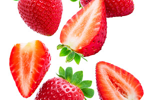 Flying in air strawberries and slice, a Food & Drink Photo by Volff