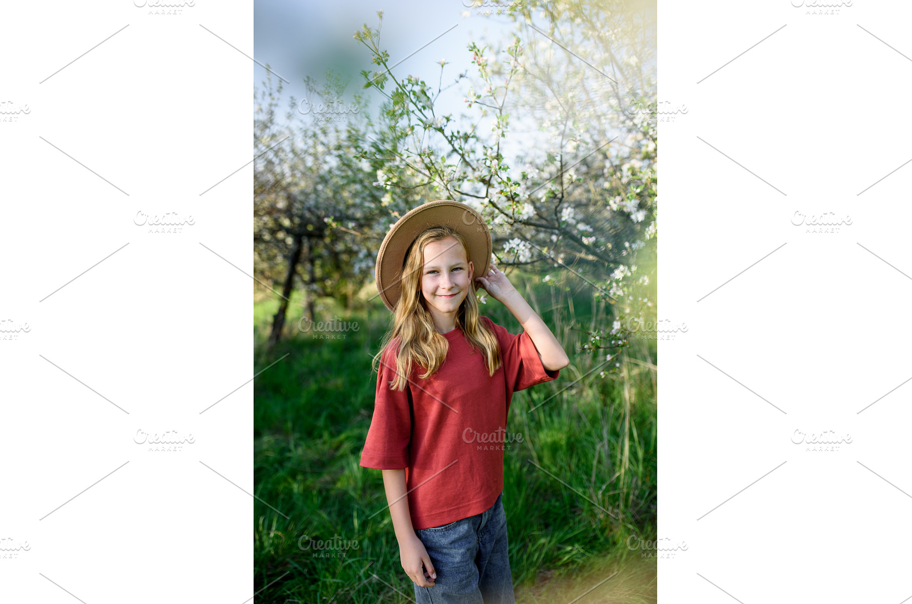 Girl enjoying spring blossoms in, a Nature Photo by HalfPoint