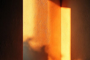 Dark Minimal Doorway with Golden Sunlight and Long Shadows, a Background Photo by José Manuel Gelpi