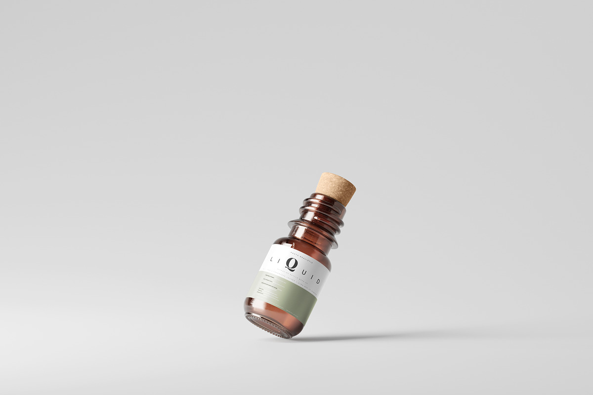 Amber Glass Bottle With Cork Mockup, a Cups & Container Mockup by pmvch (Photo 4 of 10)