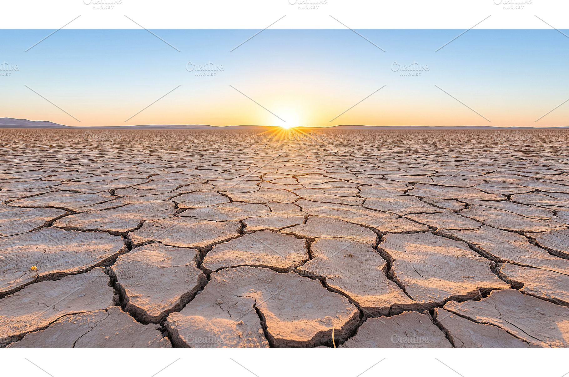 Dramatic sunrise over cracked desert, a Nature Photo by Lermont51