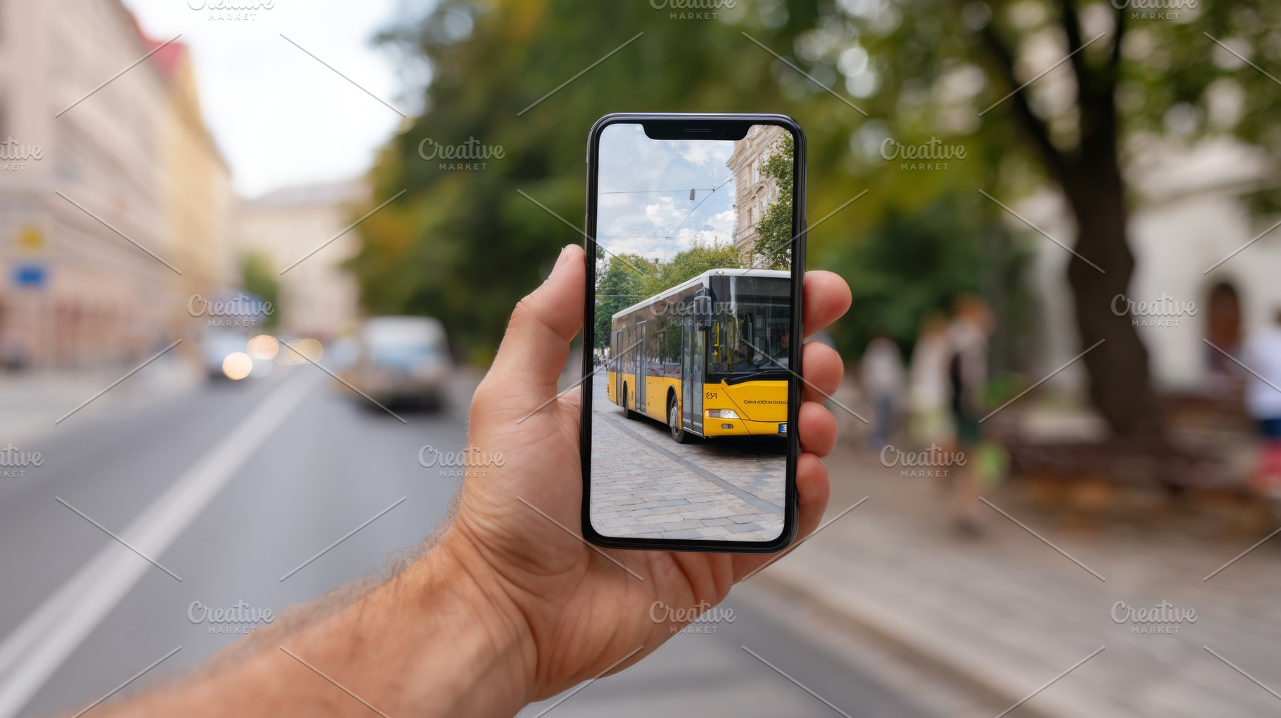 A person's hand holds a smartphone displaying a city bus, highlighting urban tr, a Business Photo by ImageMir