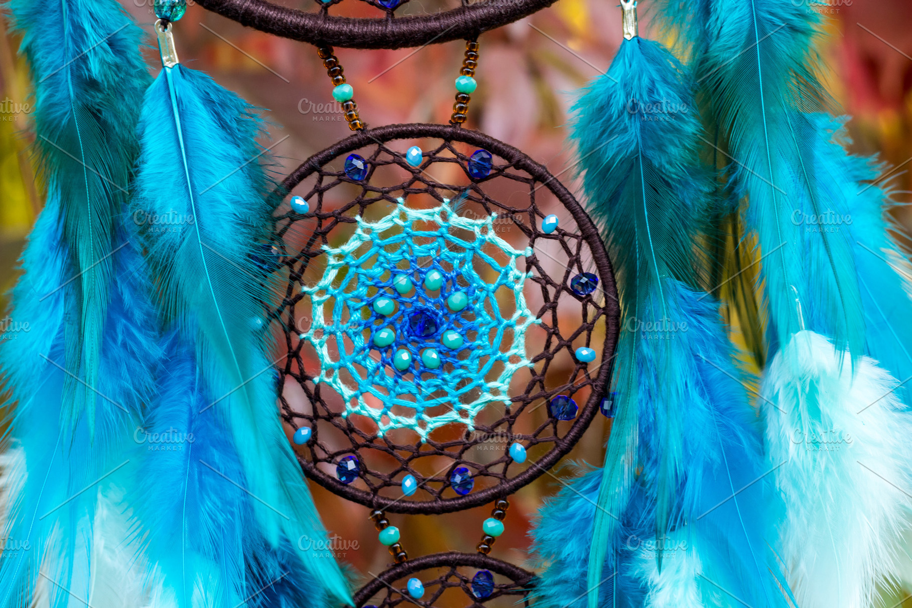 Handmade dream catcher with feathers featuring dreamcatcher, dream-catcher, an Arts & Entertainment Photo by dashtik