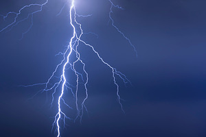 Lightning in night storm. Blue light