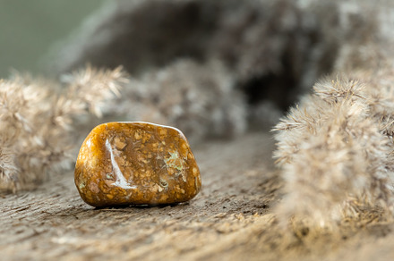 Yellow Jasper Tumbled Gem Stone, an Industrial Photo by Andriana Syvanych