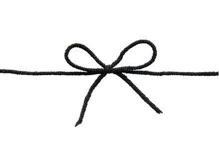 Black thread isolate on white, a Background Photo by yanadjana