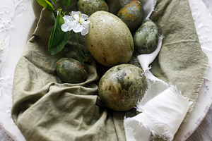 Happy Easter! Stylish natural dyed eggs and spring flowers on gr, a Holiday Photo by Sonjachni