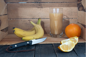 Knife and sliced orange. Fruits in a, a Food & Drink Photo by Stockphoto by vzwer