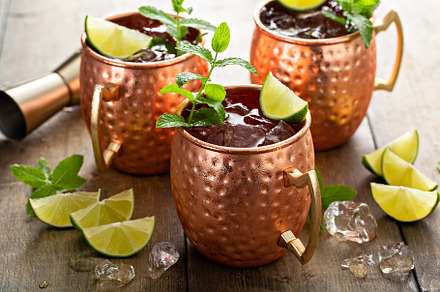 Traditional Moscow Mule in classic copper mugs, a Food & Drink Photo by farwasser