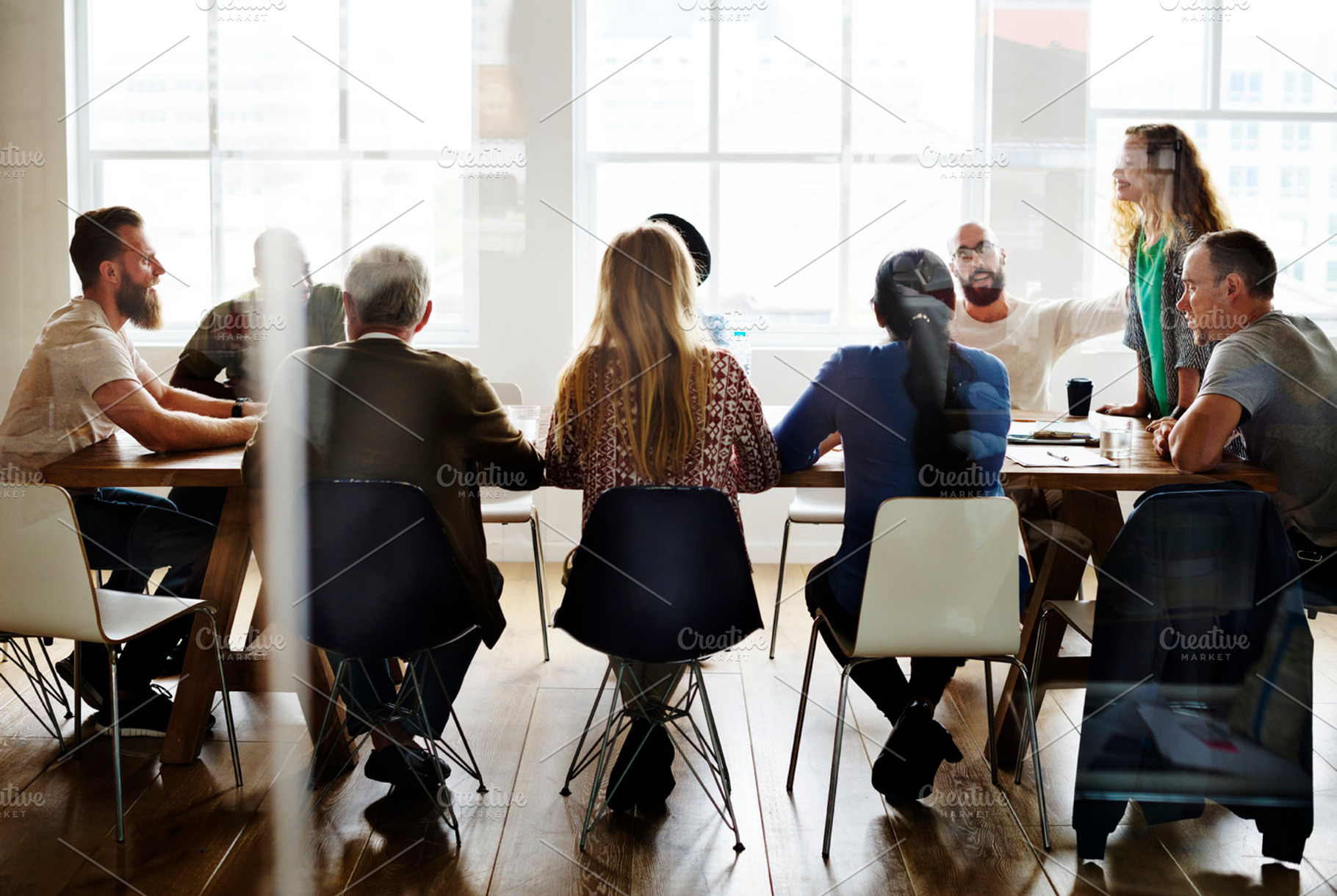Diverse group of people in a seminar containing person, collaboration, and, a Person Photo by rawpixel