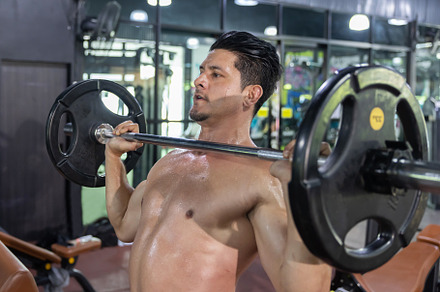 Man Pumping Up Muscles