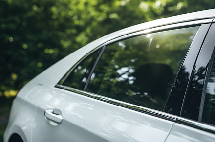 Closeup photo of a new white modern car, a Transportation Photo by AlyaAnd