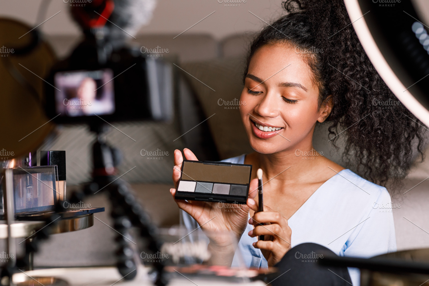 Smiling influencer making a review, a Person Photo by Artem Varnitsin