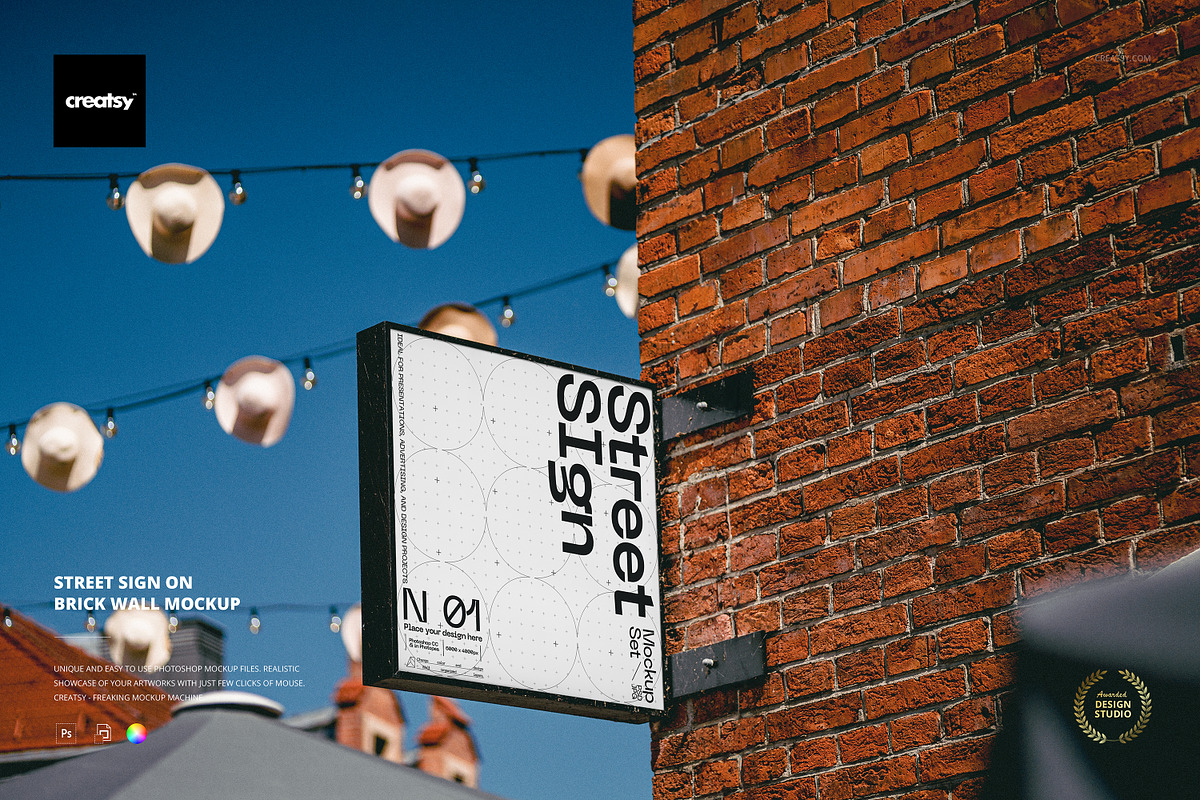 Street Sign on Brick Wall Mockup, an Advertising Mockup by creatsy5 (Photo 1 of 3)