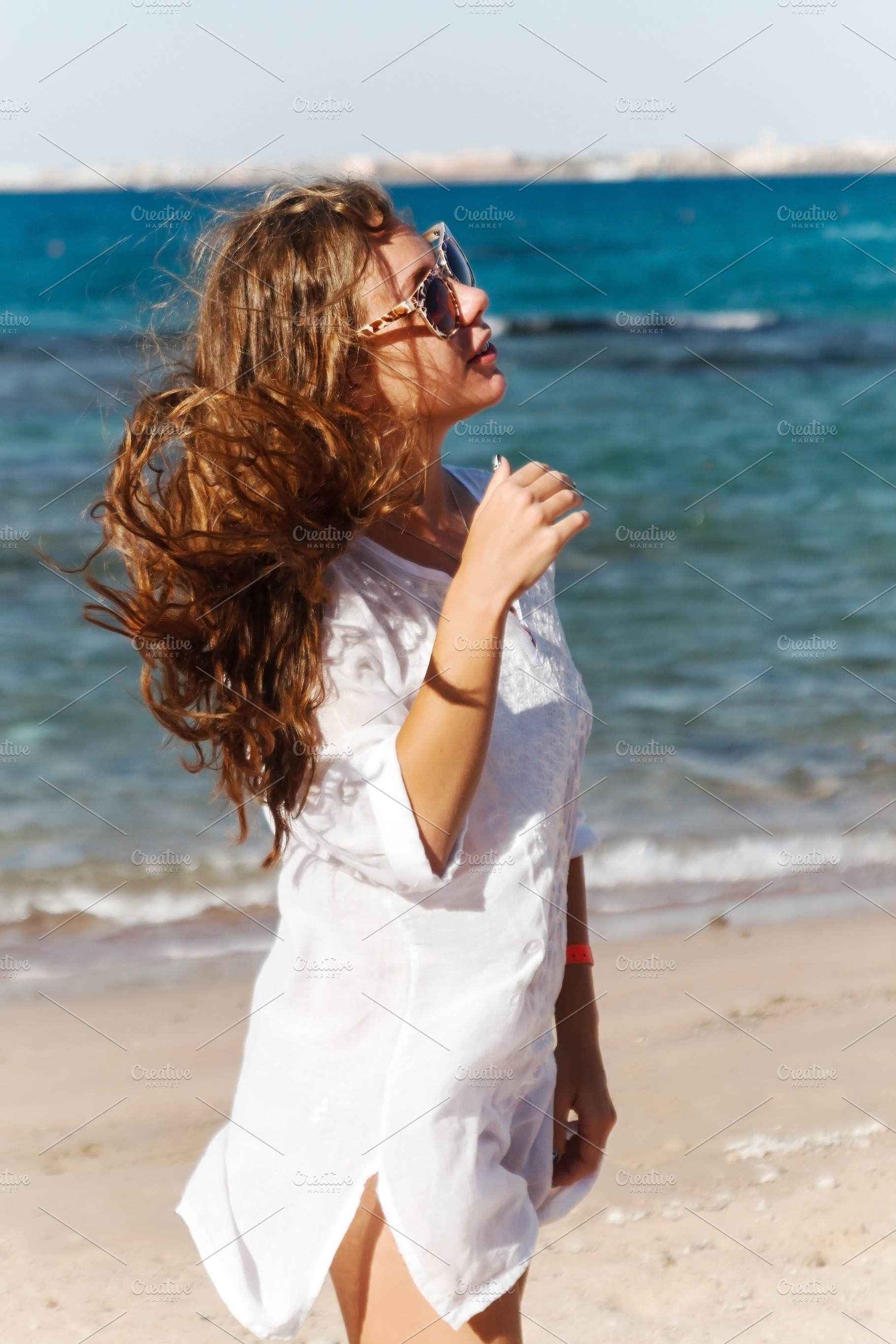 close-up portrait of a beautiful young brunette girl with long h, a Person Photo by TanaCh
