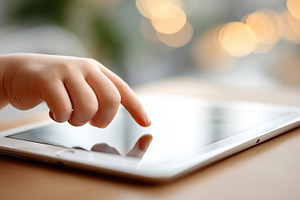 Child's hand touches the screen of, a Technology Photo by MistyDay
