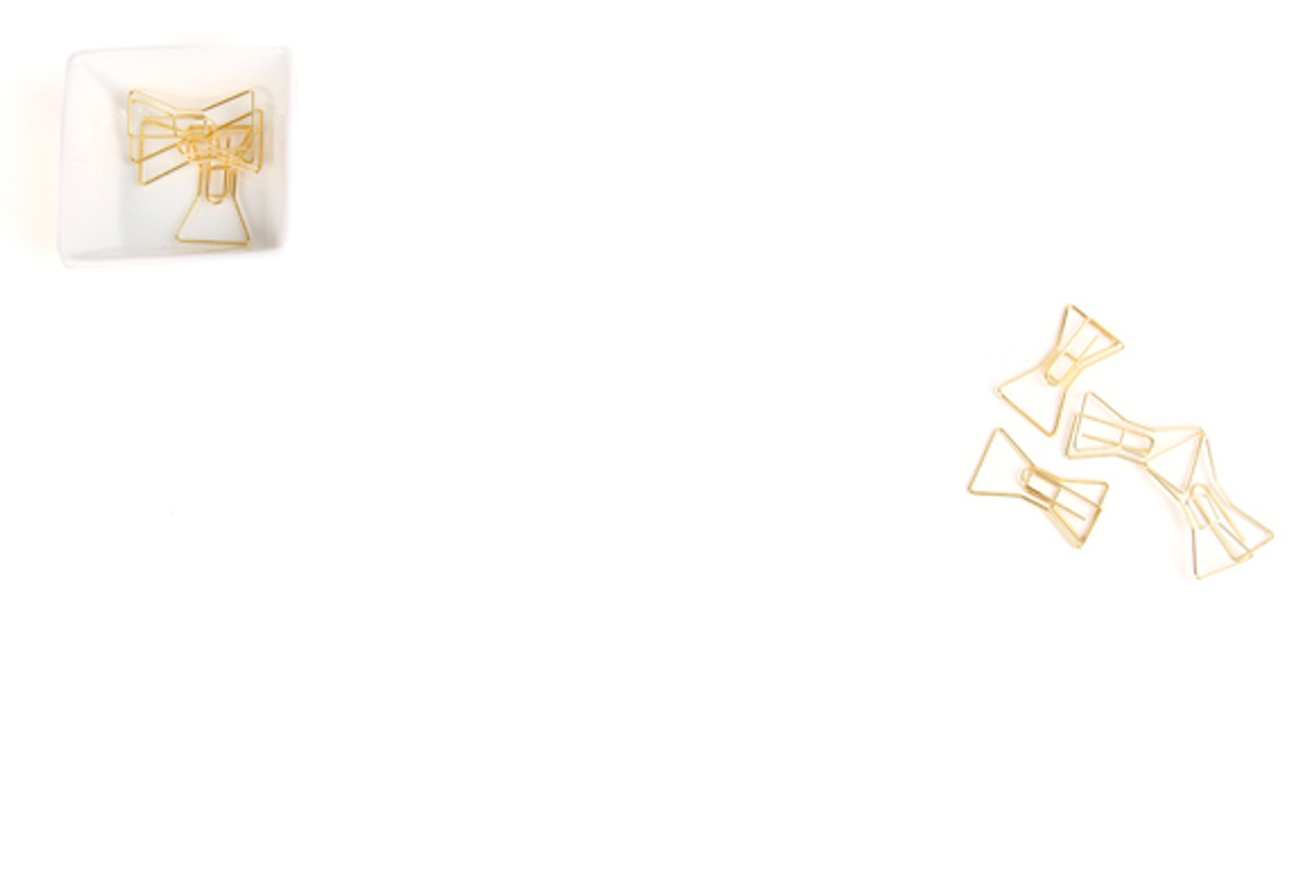 Styled Stock Gold Bowtie Paperclips, a Product Mockup by Stockographer