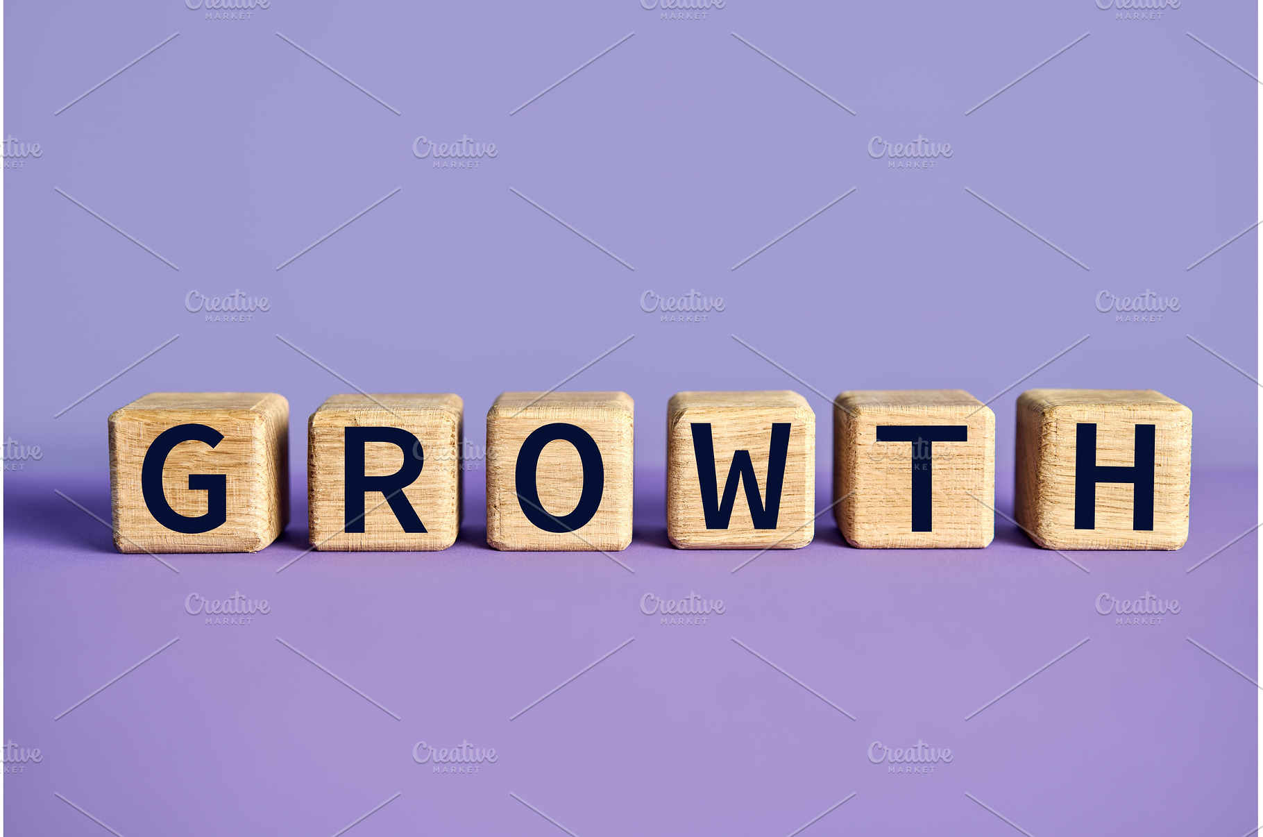 Wooden blocks spelling the word, a Business Photo by Gladkov photography