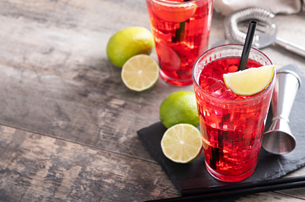 Cape Codder cocktail with vodka, cranberry juice and lime on woo, a Food & Drink Photo by etorres69