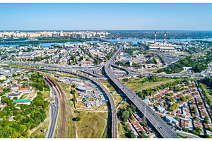 Aerial view of a road and railway featuring aerial, bridge, and city, a Transportation Photo by Leonid Andronov