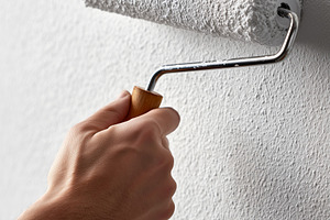 Close up of a hand using a roller, a Background Photo by MistyDay