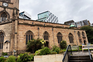 Historic church exterior and 1939 memorial inscription in Liverp