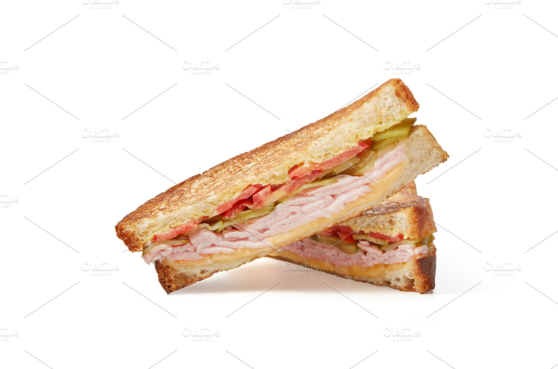Two slices of club sandwich made, a Food & Drink Photo by Yaroslav Danylchenko