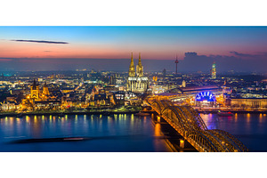Cologne at dusk containing cologne, koeln, and germany