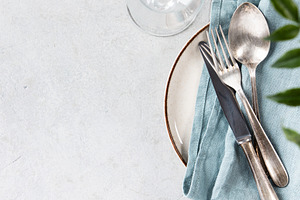 Elegant Table Setting with Vintage Cutlery and Greenery, a Food & Drink Photo by Natalia Klenova's Shop