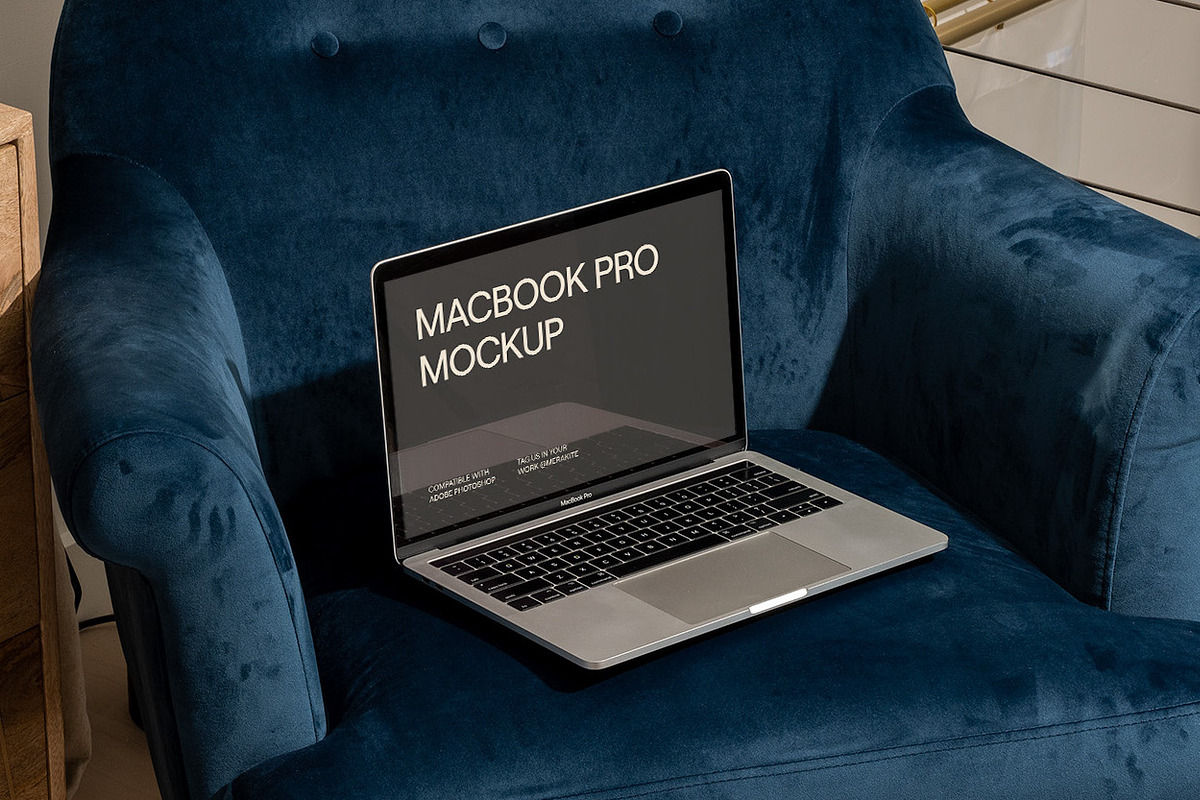 MacBook Pro Mockup Staged with Chair, a Books & Magazine Mockup by Area Mockups (Photo 2 of 4)