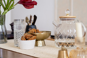 Dining room home atmosphere glass candle flower, a Background Photo by Photo Drive Studio