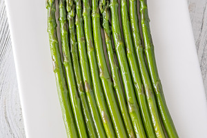 Tender boiled asparagus arranged nea, a Food & Drink Photo by Alexander Prokopenko