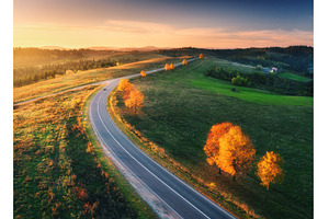 Aerial view of winding road in, a Nature Photo by den-belitsky