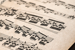 Music notation book containing music, notes, and sheet