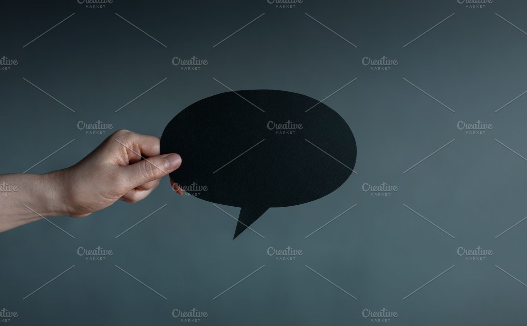Holding blank speech bubble in dark , Social pressure, emotional, a Photo by salmon.black