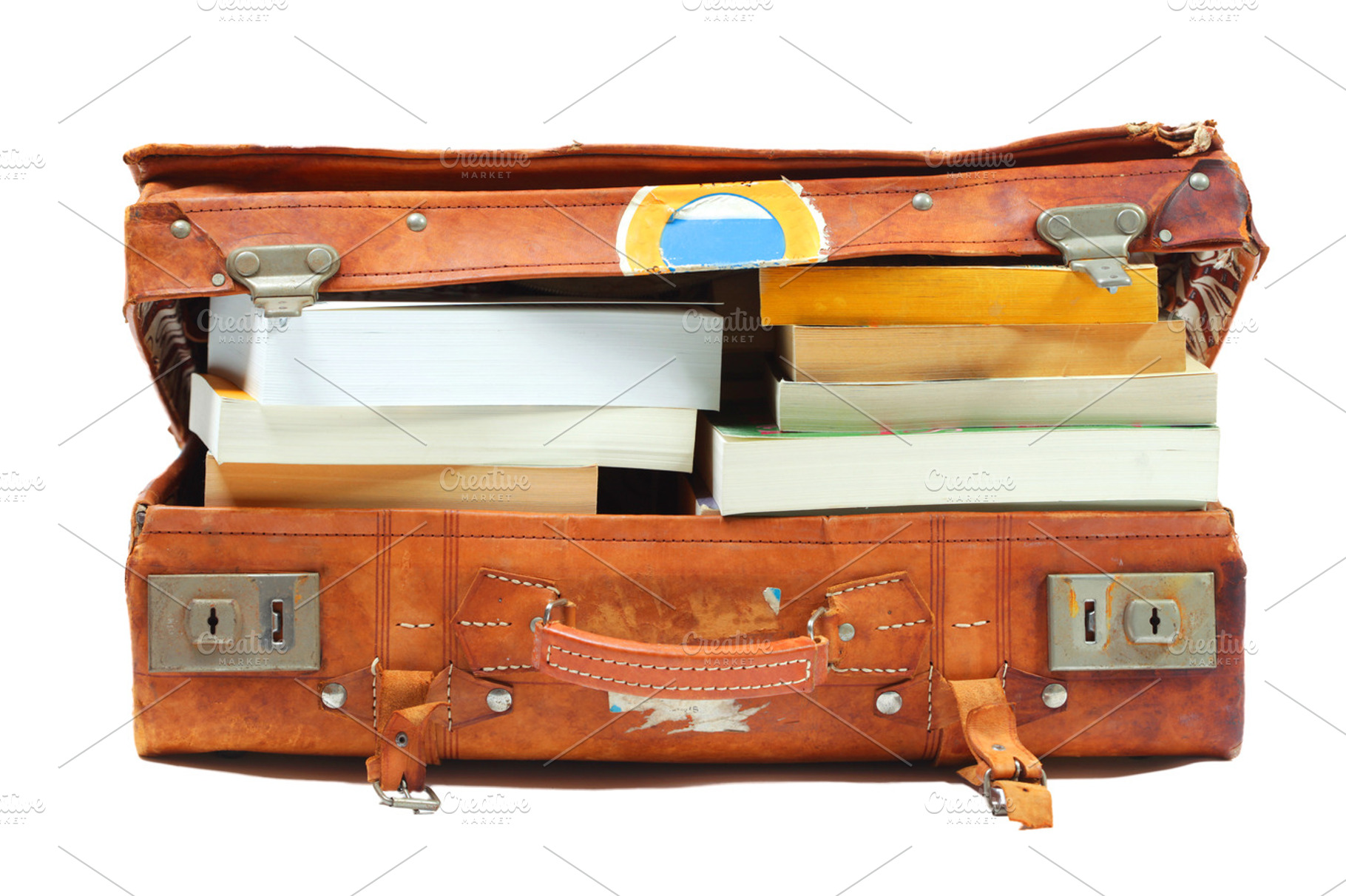 Open suitcase stuffed with books only