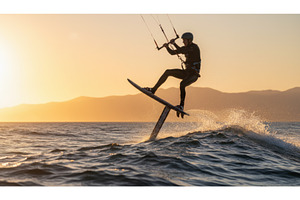 Kitesurfer on a hydrofoil board, a Sports & Recreation Photo by Igor Tichonow