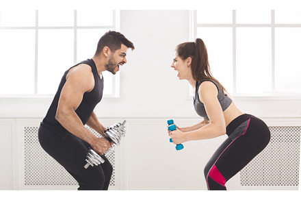 Active couple hardly working out and, a Sports & Recreation Photo by Prostock-Studio