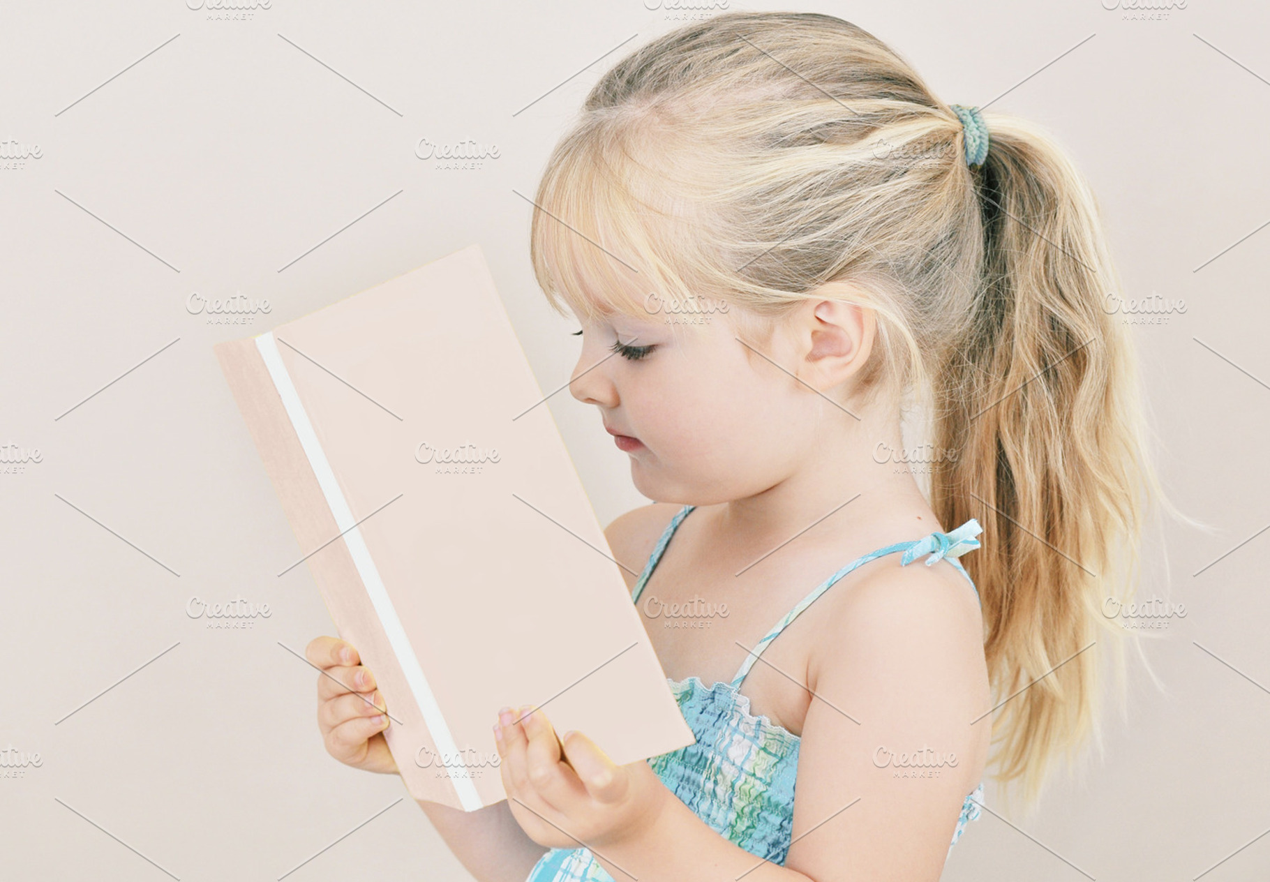 Girl Reads a Book, a Person Photo by Carolyn Sandstrom Art